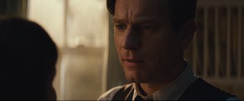 Movie still from “Christopher Robin” (2018), directed by Marc Forster – A man's face in the sunlight; Close Up shot, Over the shoulder angle