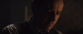 Movie still from “Christopher Robin” (2018), directed by Marc Forster – A man's face in the dark; Close Up shot, Over the shoulder angle