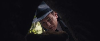 Movie still from “Christopher Robin” (2018), directed by Marc Forster – A person wearing a hat; Close Up shot, Low angle