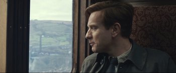 Movie still from “Christopher Robin” (2018), directed by Marc Forster – A person looking out of a window; Close Up shot, Over the shoulder angle