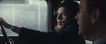 Movie still from “Christopher Robin” (2018), directed by Marc Forster – A woman sitting in a car looking out the window; Close Up shot, Over the shoulder angle