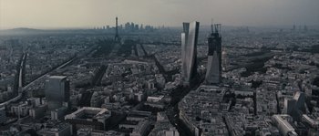 Movie still from “Chrysalis” (2007), directed by Julien Leclercq – An aerial view of a large city with tall buildings; Extreme Wide shot, High angle