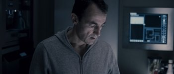 Movie still from “Chrysalis” (2007), directed by Julien Leclercq – A person wearing a jacket; Close Up shot, Low angle