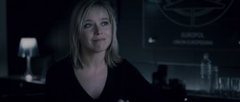 Movie still from “Chrysalis” (2007), directed by Julien Leclercq – A person wearing a black shirt; Close Up shot, Over the shoulder angle