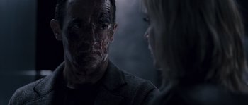 Movie still from “Chrysalis” (2007), directed by Julien Leclercq – A man and a woman are looking at each other; Close Up shot, Over the shoulder angle