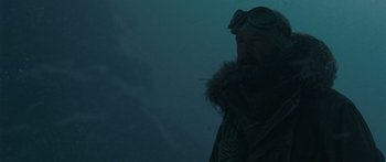 Movie still from “The Day the Earth Stood Still” (2008), directed by Scott Derrickson – A man wearing a winter coat and goggles; Close Up shot, Low angle