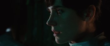 Movie still from “The Day the Earth Stood Still” (2008), directed by Scott Derrickson – A woman's face in the dark; Close Up shot, Low angle