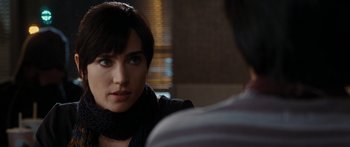 Movie still from “The Day the Earth Stood Still” (2008), directed by Scott Derrickson – A woman sitting in front of another woman; Close Up shot, Over the shoulder angle