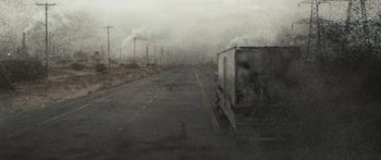 Movie still from “The Day the Earth Stood Still” (2008), directed by Scott Derrickson – A truck driving down a road with smoke billowing out of it; Extreme Wide shot, High angle