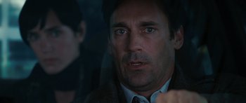 Movie still from “The Day the Earth Stood Still” (2008), directed by Scott Derrickson – A person wearing a suit and tie; Close Up shot, Over the shoulder angle