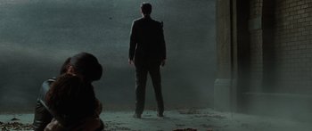 Movie still from “The Day the Earth Stood Still” (2008), directed by Scott Derrickson – A man standing in the middle of a room; Wide shot, Low angle