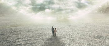 Movie still from “The Day the Earth Stood Still” (2008), directed by Scott Derrickson – A man and a child standing in the middle of a field; Extreme Wide shot, High angle