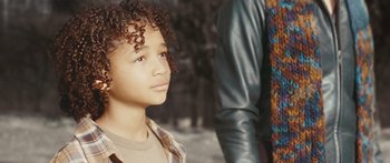 Movie still from “The Day the Earth Stood Still” (2008), directed by Scott Derrickson – A person with curly hair; Close Up shot, High angle