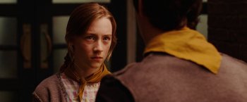 Movie still from “City of Ember” (2008), directed by Gil Kenan – A young girl looking into a mirror while standing next to a young man; Close Up shot, Over the shoulder angle