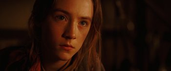 Movie still from “City of Ember” (2008), directed by Gil Kenan – A person's face in a dark room; Close Up shot, High angle