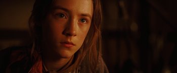 Movie still from “City of Ember” (2008), directed by Gil Kenan – A person with long brown hair; Close Up shot, High angle