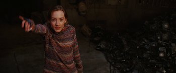 Movie still from “City of Ember” (2008), directed by Gil Kenan – A young girl standing in an abandoned room; Medium shot, High angle