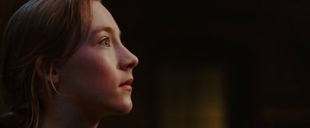 Movie still from “City of Ember” (2008), directed by Gil Kenan – A woman's face in the dark; Close Up shot, Low angle