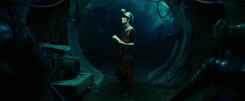 Movie still from “City of Ember” (2008), directed by Gil Kenan – A man standing in the middle of an underground tunnel; Medium shot, Low angle