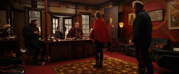 Movie still from “City of Ember” (2008), directed by Gil Kenan – A woman standing in front of a table in front of a mirror; Wide shot, Over the shoulder angle