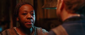 Movie still from “City of Ember” (2008), directed by Gil Kenan – A woman looking into a mirror while wearing a necklace; Close Up shot, Over the shoulder angle