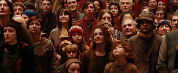 Movie still from “City of Ember” (2008), directed by Gil Kenan – A group of people standing in a room; Medium shot, High angle