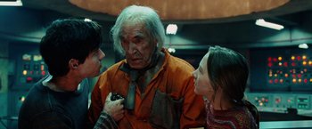 Movie still from “City of Ember” (2008), directed by Gil Kenan – A group of people standing next to each other in a room; Close Up shot, Over the shoulder angle