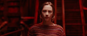 Movie still from “City of Ember” (2008), directed by Gil Kenan – A young woman with long blonde hair wearing a red sweater; Close Up shot, Low angle