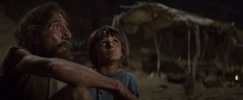 Movie still from “Clash of the Titans” (2010), directed by Louis Leterrier – A young boy looking up into the sky; Close Up shot, Low angle