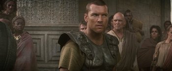 Movie still from “Clash of the Titans” (2010), directed by Louis Leterrier – A person wearing armor; Close Up shot, Over the shoulder angle