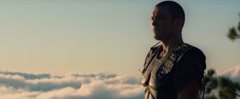 Movie still from “Clash of the Titans” (2010), directed by Louis Leterrier – A person wearing a military uniform; Medium shot, Low angle