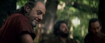 Movie still from “Clash of the Titans” (2010), directed by Louis Leterrier – A man with grey hair and a man with a beard; Close Up shot, Over the shoulder angle