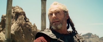 Movie still from “Clash of the Titans” (2010), directed by Louis Leterrier – A person wearing a costume; Close Up shot, Low angle