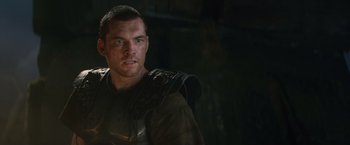 Movie still from “Clash of the Titans” (2010), directed by Louis Leterrier – A person wearing armor; Close Up shot, Low angle