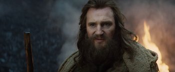 Movie still from “Clash of the Titans” (2010), directed by Louis Leterrier – A person with long hair and a beard; Close Up shot, Low angle