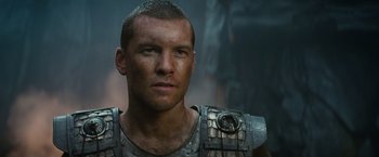 Movie still from “Clash of the Titans” (2010), directed by Louis Leterrier – A person wearing armor; Close Up shot, Low angle