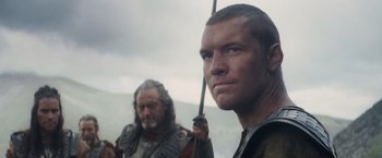 Movie still from “Clash of the Titans” (2010), directed by Louis Leterrier – Two men are standing in front of each other; Close Up shot, Over the shoulder angle