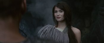 Movie still from “Clash of the Titans” (2010), directed by Louis Leterrier – A beautiful young lady with long black hair; Close Up shot, Over the shoulder angle