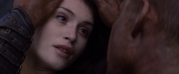 Movie still from “Clash of the Titans” (2010), directed by Louis Leterrier – A person laying on the ground; Extreme Close Up shot, Overhead angle