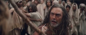 Movie still from “Clash of the Titans” (2010), directed by Louis Leterrier – An old man with long grey hair and a long beard; Close Up shot, High angle