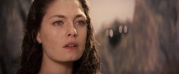 Movie still from “Clash of the Titans” (2010), directed by Louis Leterrier – A woman's face with a blurry background; Close Up shot, Low angle