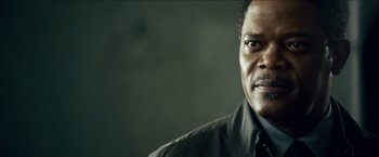 Movie still from “Cleaner” (2007), directed by Renny Harlin – A person wearing a shirt and tie; Close Up shot, Low angle