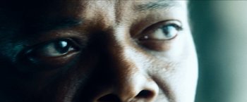Movie still from “Cleaner” (2007), directed by Renny Harlin – A man's eyes and face; Extreme Close Up shot, Low angle