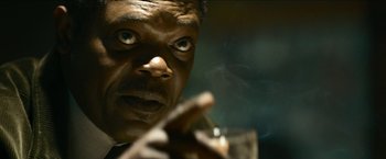 Movie still from “Cleaner” (2007), directed by Renny Harlin – A man smoking a cigarette; Extreme Close Up shot, Low angle