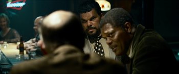 Movie still from “Cleaner” (2007), directed by Renny Harlin – Two men in suits and ties are looking at each other; Close Up shot, Over the shoulder angle