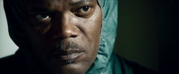 Movie still from “Cleaner” (2007), directed by Renny Harlin – A man's face wearing a hood; Close Up shot, Low angle