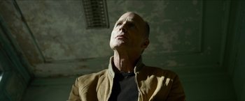 Movie still from “Cleaner” (2007), directed by Renny Harlin – An older man looking up into the sky; Close Up shot, Low angle
