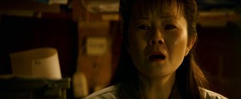 Movie still from “Cleaner” (2007), directed by Renny Harlin – A person with her eyes closed; Close Up shot, Low angle