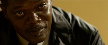 Movie still from “Cleaner” (2007), directed by Renny Harlin – A person's face in a room; Extreme Close Up shot, Low angle