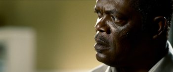 Movie still from “Cleaner” (2007), directed by Renny Harlin – A person's face in a room; Close Up shot, Low angle